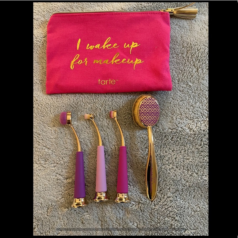 4 paddle-style makeup brushes made by tarte